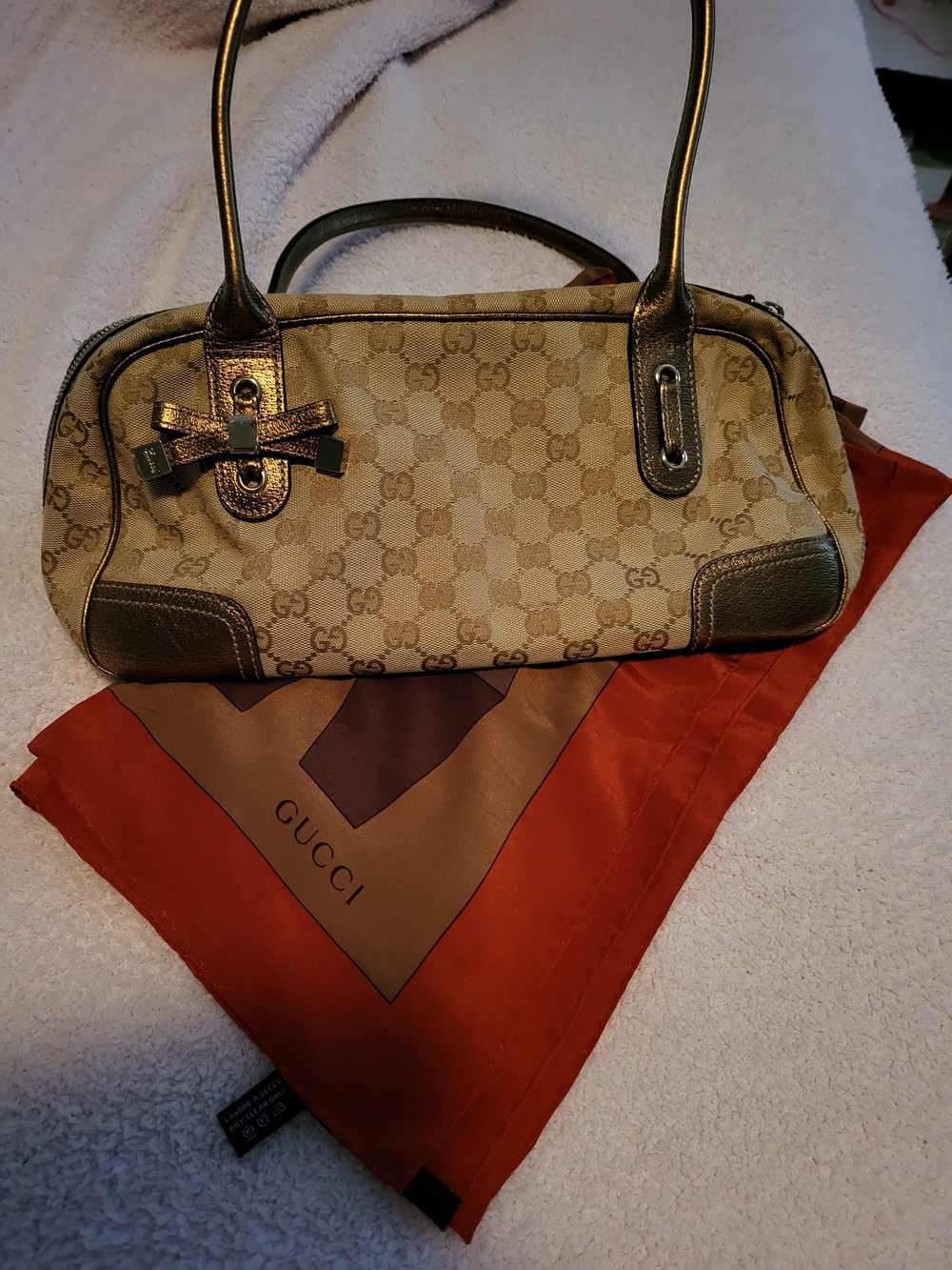 Gucci Beige Monogram Shoulder Bag with Metallic Brown Trim and Bow